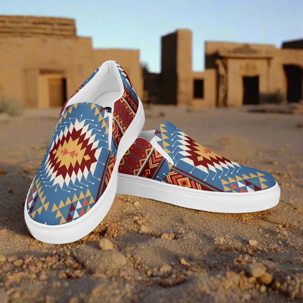 Slip-on Canvas Shoes Veyo Southwest Print with colorful geometric patterns on a sandy background