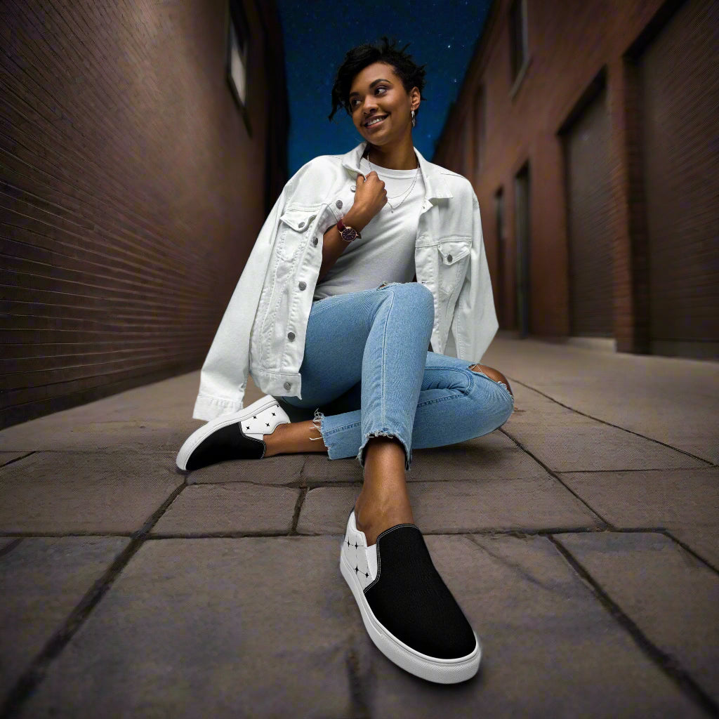 White Diamond Two Tone Slip-on Canvas Shoes worn with denim jeans and a white jacket in an urban setting