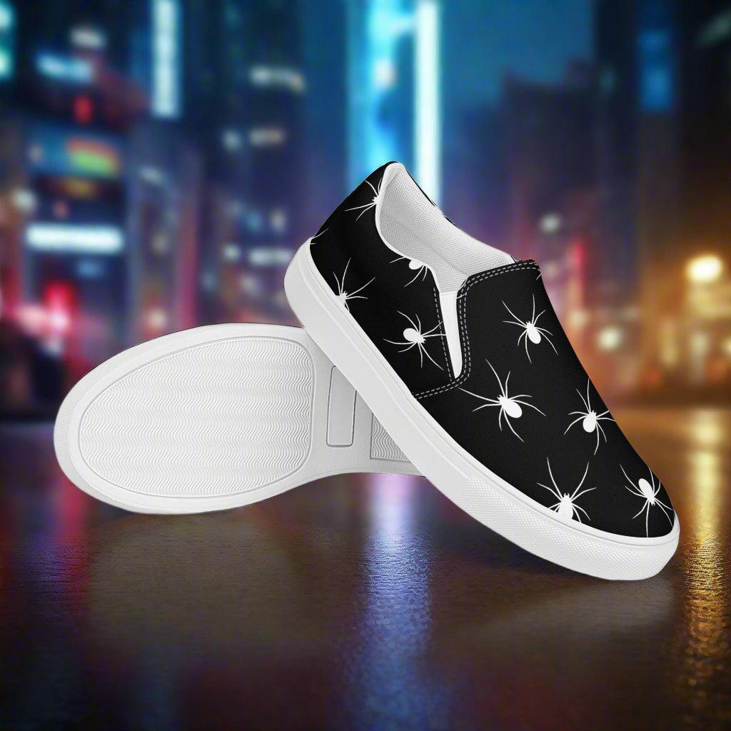 Stylish White Spiders Slip-On Canvas Shoes featuring a black design for casual wear