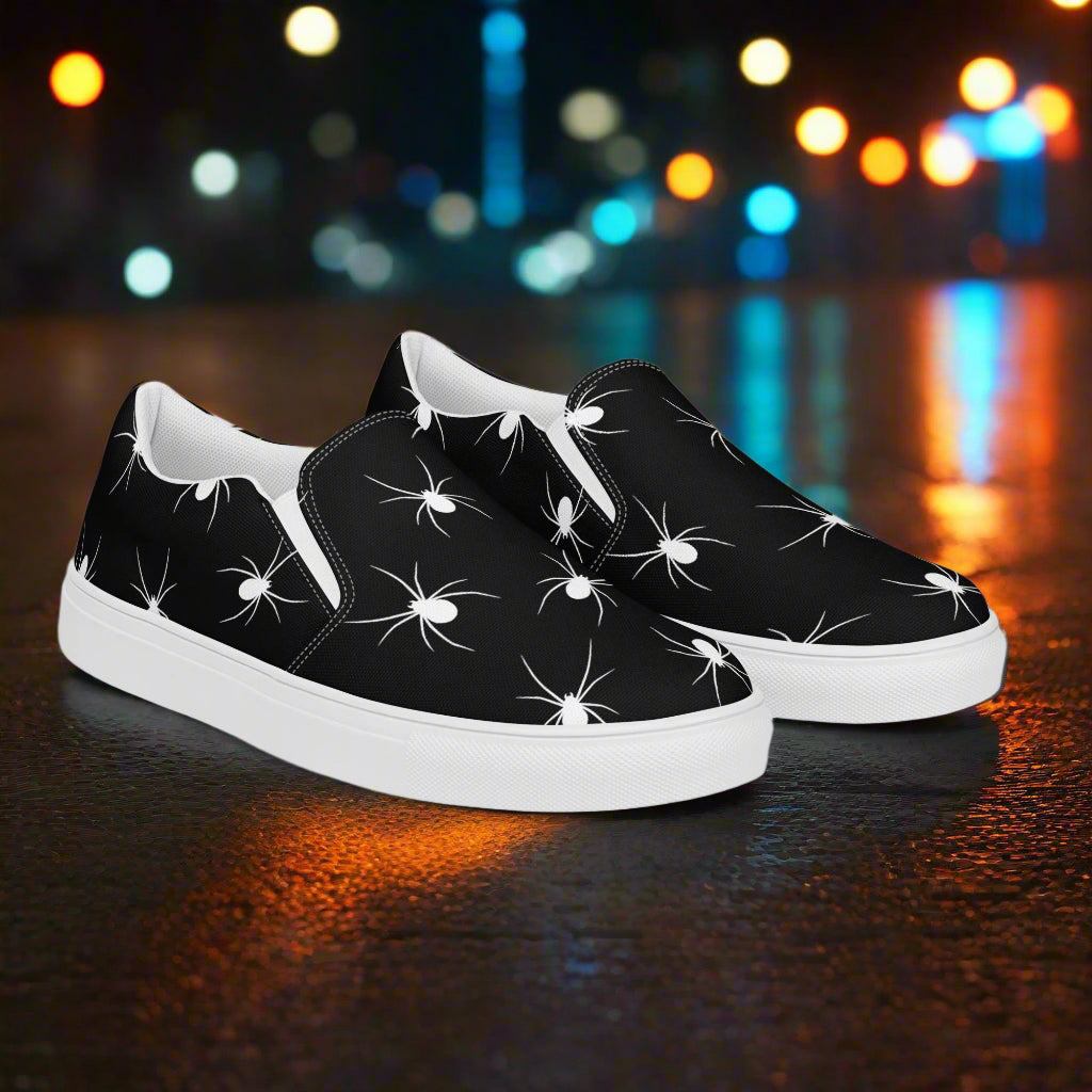 White Spiders Slip-On Canvas Shoes featuring a unique spider pattern on a black background