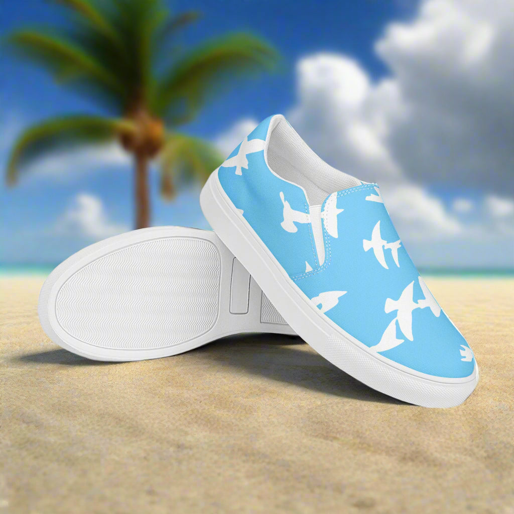 Whitebirds Blue Slip-on Canvas Shoes featuring a unique bird print and comfortable design for casual wear
