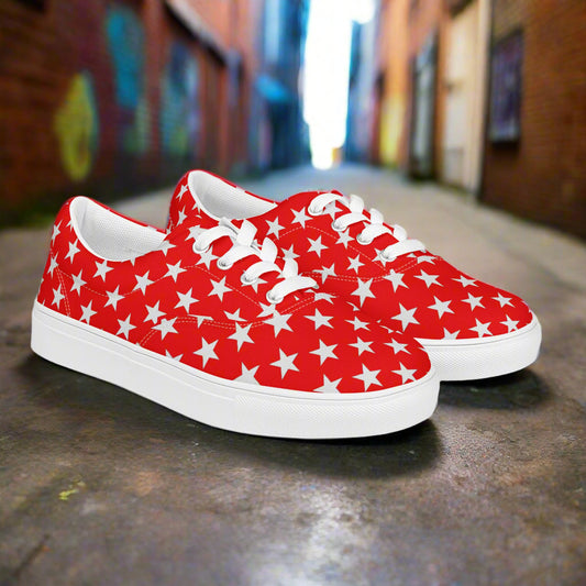 red lace up canvas sneakers with a white star pattern