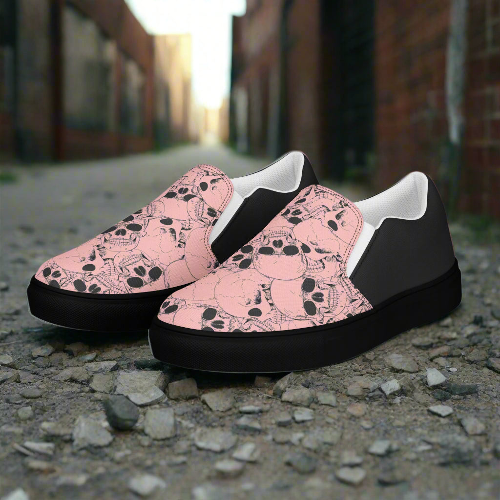 Custom Women's Slip On Canvas Sneakers Pink with Black Outline Skulls Print Two Tone