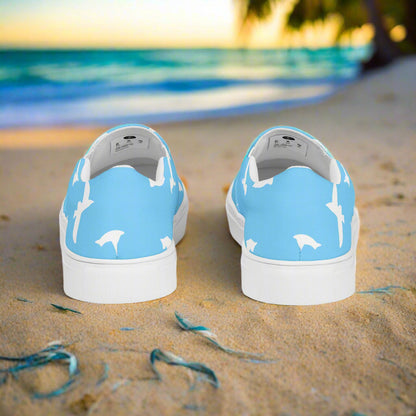 WildSage Custom Women’s Animal Print Slip-on Canvas Shoes, White Birds Flying on a Blue Background