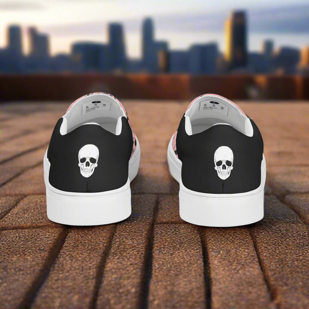 Custom Women's Slip On Canvas Sneakers Pink with Black Outline Skulls Print Two Tone
