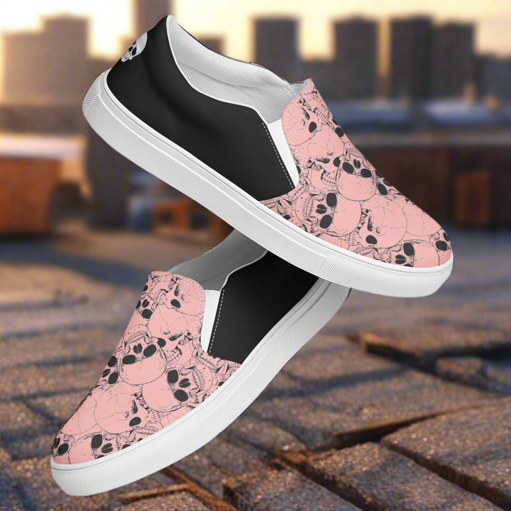 Custom Women's Slip On Canvas Sneakers Pink with Black Outline Skulls Print Two Tone