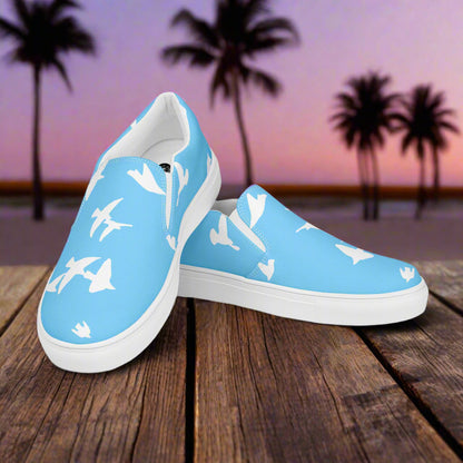 WildSage Custom Women’s Animal Print Slip-on Canvas Shoes, White Birds Flying on a Blue Background