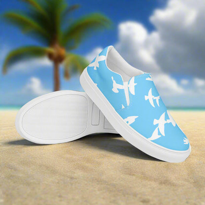 WildSage Custom Women’s Animal Print Slip-on Canvas Shoes, White Birds Flying on a Blue Background