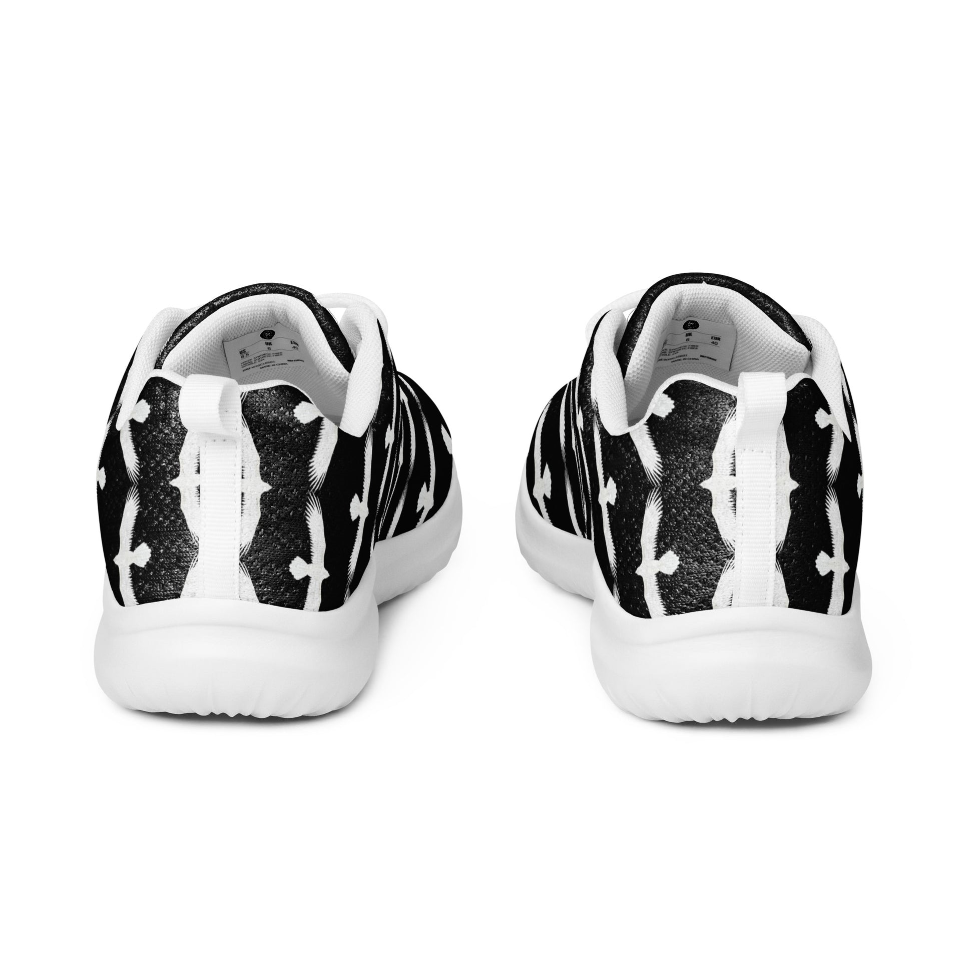 Back view of WildSage Market womrns white raven athletic shoes with black and white patterned design